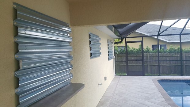 Ms Lehman put metal shutters on the window to protect her house in Florida from Hurricane Irma.