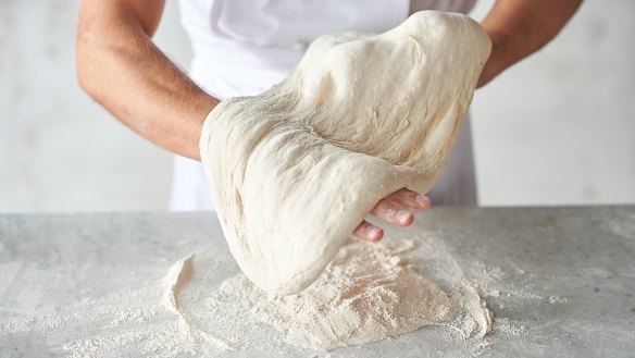 Shaping the base step 8: Once stretched to the desired size (our pizzas are around 30cm in diameter), place the base back on the work surface and neaten into a circle. The pizza base is now ready to dress with the toppings and then bake.