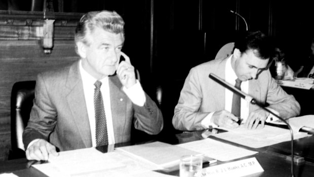 Australian Prime Minister Bob Hawke (left) and Treasurer Paul Keating (right) at the opening day of the National Economic Summit in Canberra on 11 April 1983. 