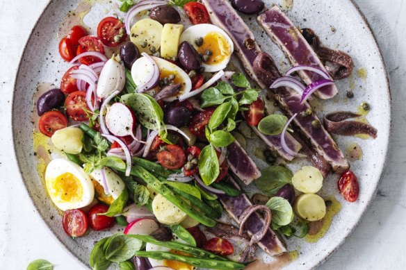 Never toss a nicoise - ingredients should be composed with an eye for colour and contrast.