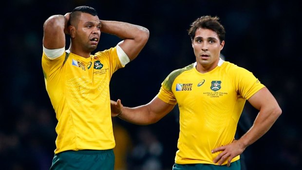 Kurtley Beale and Nick Phipps are dejected following Australia's defeat.
