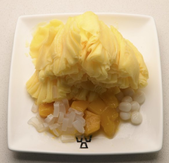 Ruffles of shaved mango ice with fresh fruit.