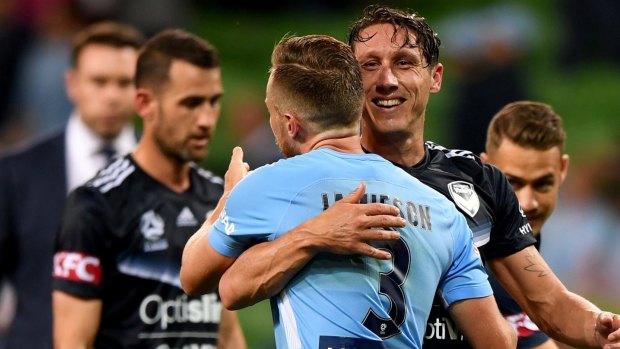Reason to smile: Mark Milligan is congratulated by City's Scott Jamieson after converting his spot kick in added time.