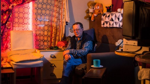 "Life has been up and down for me": Clive, 67, sits in his Waterloo flat.