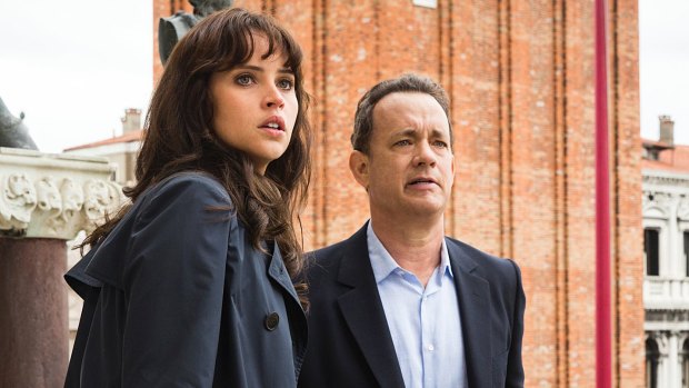 Langdon (Tom Hanks) and Sienna (Felicity Jones) on the balcony of St. Marks Basilica in Columbia Pictures' INFERNO. Felicity Jones and Tom Hanks in Inferno.