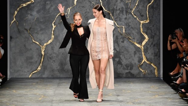 Designer Michelle Aznavorian of Misha Collection (left, pictured with model Bella Hadid at Fashion Week Australia) supports the rental industry.