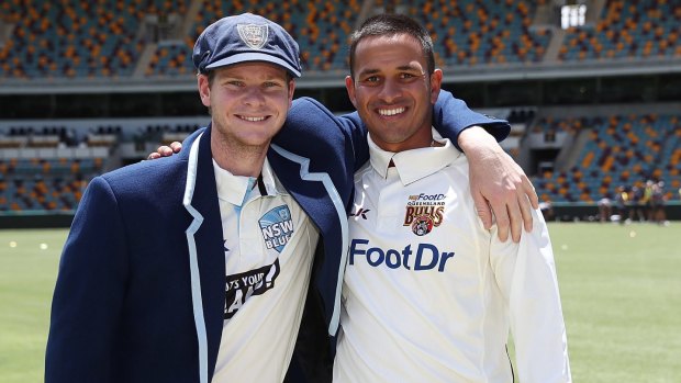 Shield action: Steve Smith and Usman Khawaja are all smiles after the coin toss at the Gabba.