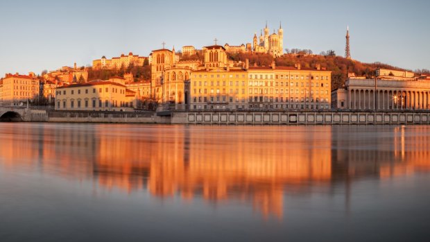 The Saone river bank in Lyon hints at the Italian-style architecture for which the city is known.