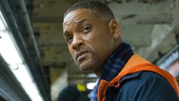 Will Smith walks through most of <i>Collateral Beauty</I> with half-closed eyes and a tightly-clamped jaw to show how sad he is.