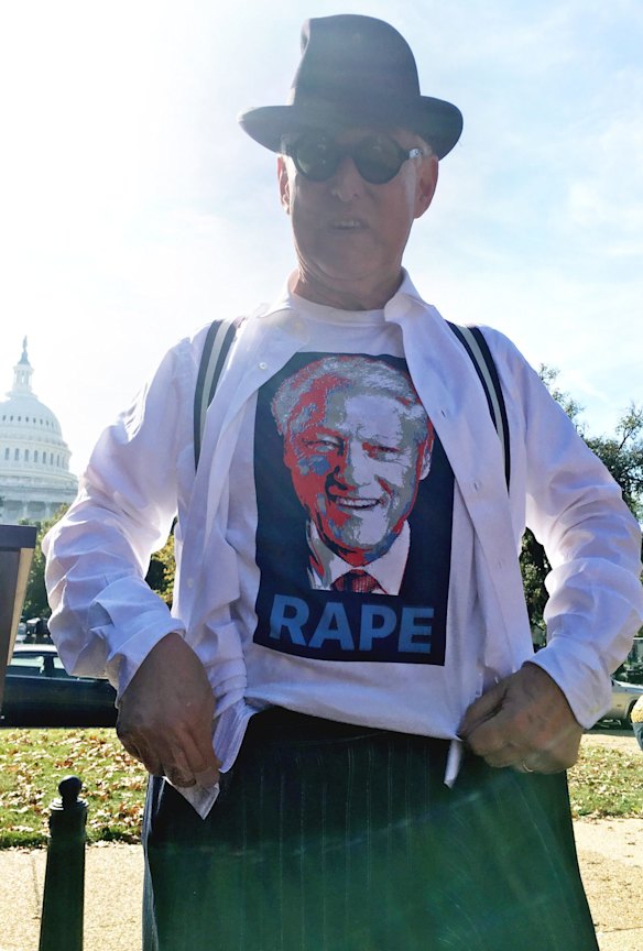 The money shot: Roger Stone reveals the Bill Clinton T-shirt under his suit.