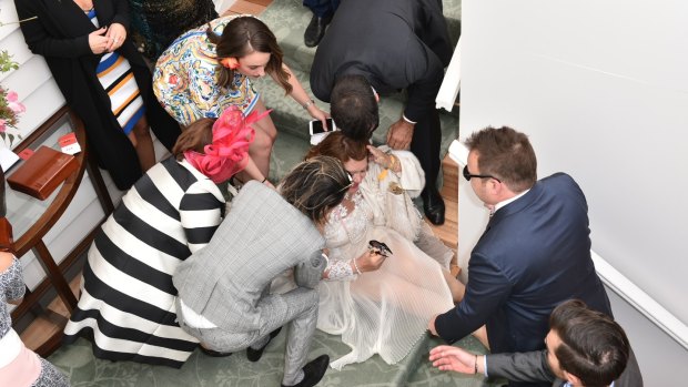 Gina Rinehart took a spill down a flight of stairs in the Emirates marquee.