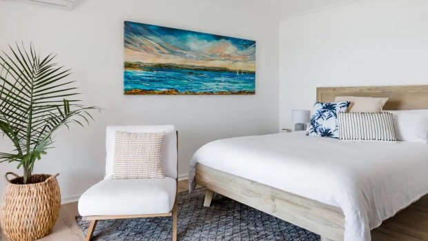 Go to sleep to the sound of waves crashing on Blacksmiths Beach and wake to sparkling water views from the master bedroom. 