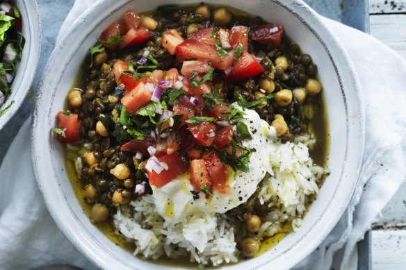 Chickpea and green lentil curry served with chopped tomatoes and coriander.