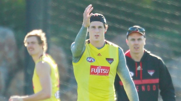 Matthew Lloyd with Jake Carlisle and Joe Daniher during an Essendon training session on June 11, 2015.