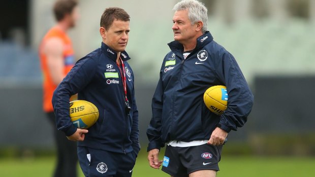 Carlton coach Brendon Bolton and then-assistant coach Neil Craig at Ikon Park in June, 2016.