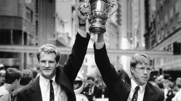 Heroes: Michael Lynagh and Nick Farr-Jones parade the trophy in 1991.