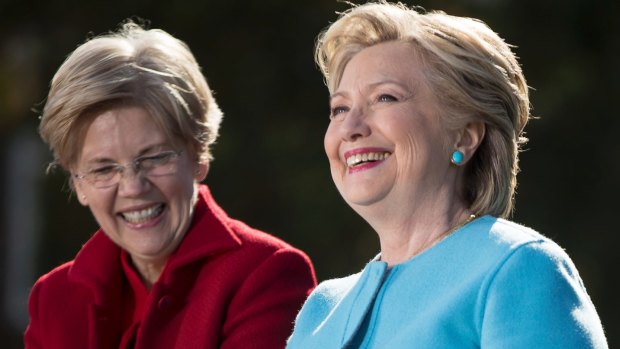 Laughing it up: Democratic presidential candidate Hillary Clinton, and Senator Elizabeth Warren.