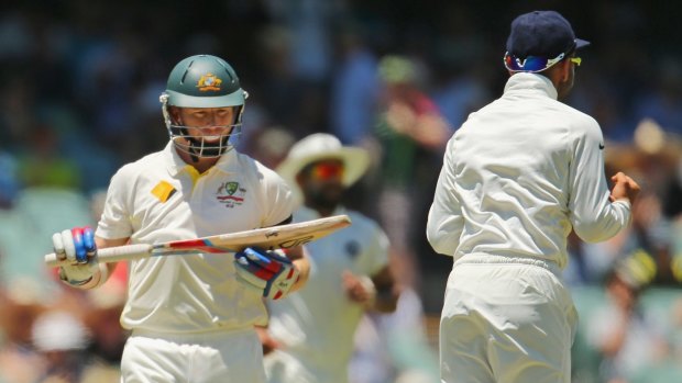 Position under threat: Chris Rogers walks off after being dismissed on Friday.