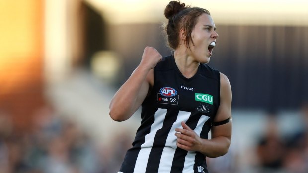 Collingwood's Jasmine Garner celebrates kicking a goal, the first of the match and her team's only major score for the night.