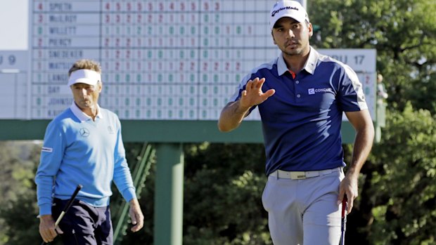 Two ways: Bernhard Langer and Jason Day, on the 18th hole.