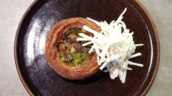 Pork hock and pea vol-au-vent with celeriac remoulade. 