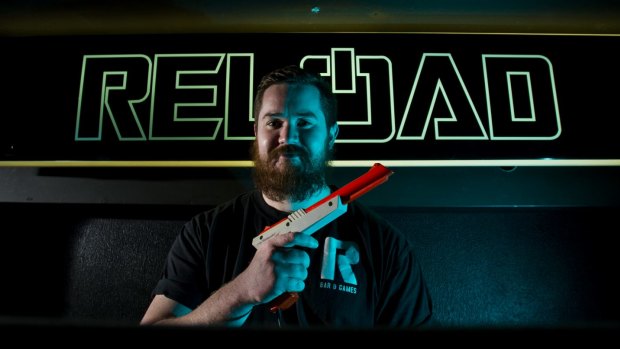 Hayden Ashley of Reload armed to play Point Blank as part of the Civic bar's Retro Gaming launch. 