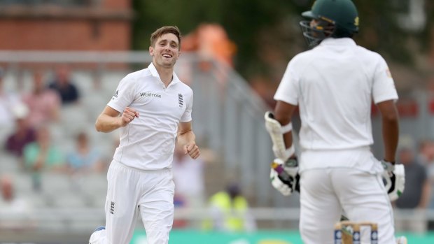 England's Chris Woakes celebrates taking the wicket of Pakistan's Rahat Ali.