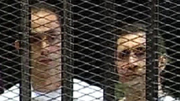 Gamal, left, and Alaa Mubarak  in court during their trial in 2011.