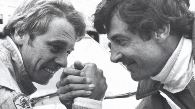 Peter Brock and Dick Johnson in an arm wrestle.