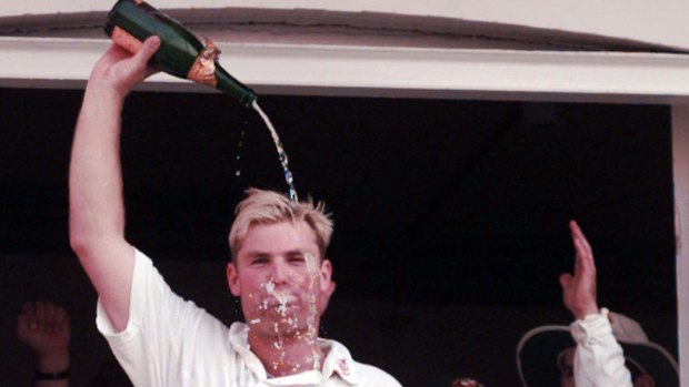  Shane Warne pours champagne over his head in after-match celebrations during the fifth Test at Trent Bridge, Nottingham, on August 10, 1997.