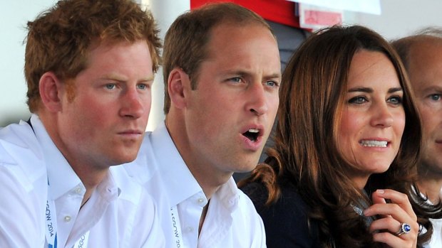 Royal flush: Harry, Will and Kate watch hockey at the Glasgow Commonwealth Games.