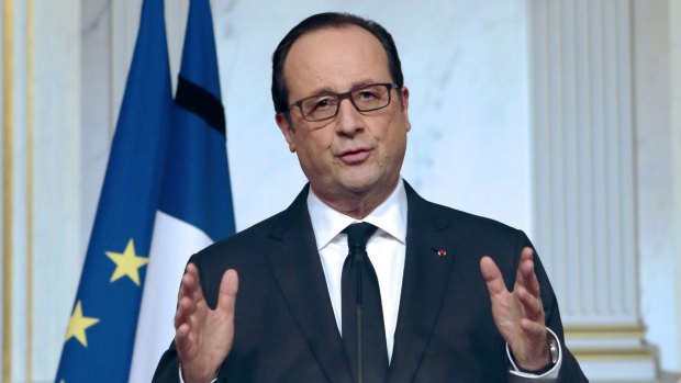 French President Francois Hollande addresses the media at the Elysee Palace on Friday.