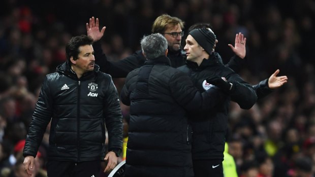Jose Mourinho and Jurgen Klopp had to be separated by the fourth official.