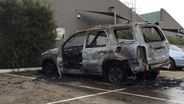The burnt out car police suspect was involved in the shooting.  