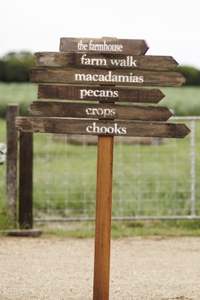 A signpost on The at Farm Byron Bay. 