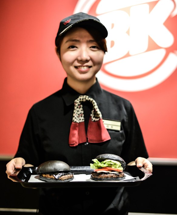 Burger King Japan customers have just two black burger options - the the Kuro Pearl, left, and the Kuro Diamond, right.