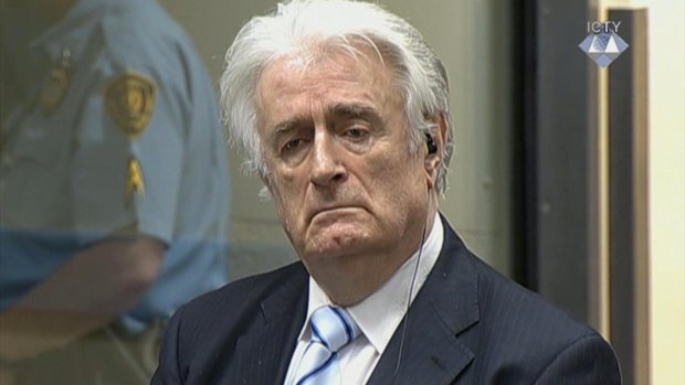 Radovan Karadzic listens as he is convicted of genocide in The Hague. 