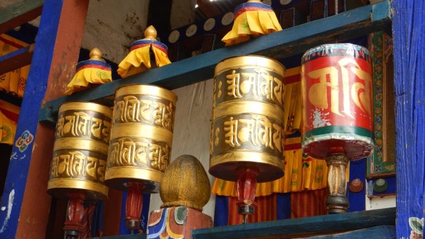 Spinning a prayer wheel helps accumulate wisdom and good karma in Bhutan.