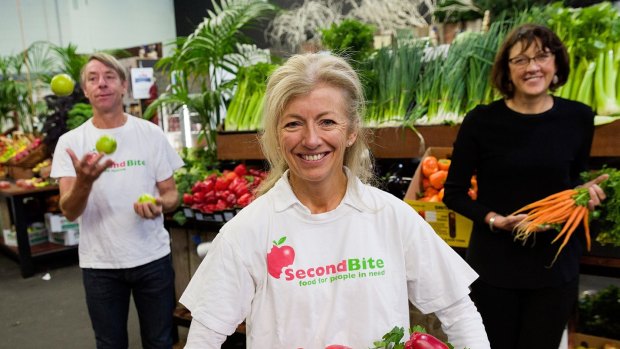 Ian and Simone Carson of food charity SecondBite, with CEO Elaine Montegriffo (right).  The Melbourne couple have been named the World Economic Forum's social entrepreneurs of the year.