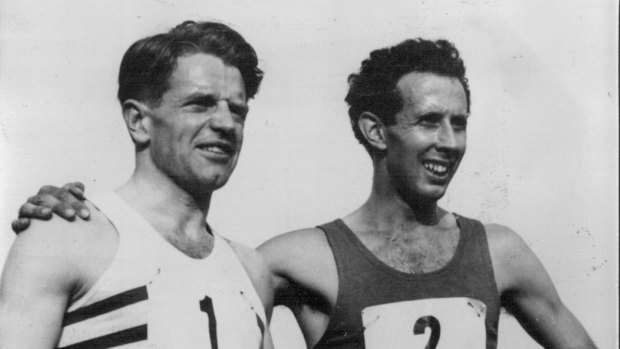 John Landy (right) after breaking the four-minute mile barrier in 1954.