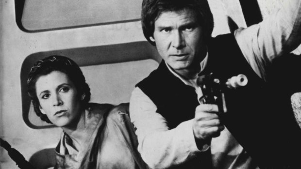 Carrie Fisher as Leia and Harrison Ford as Han Solo.