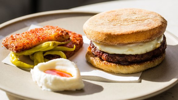 Al-muhuffin, house merguez sausage, fried egg, batata harra hash brown and toum from Nour in Sydney.