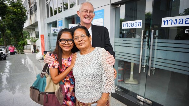 Alan Morison and Chutima Sidasathian with Chutima's mother after their acquittal in Phuket.