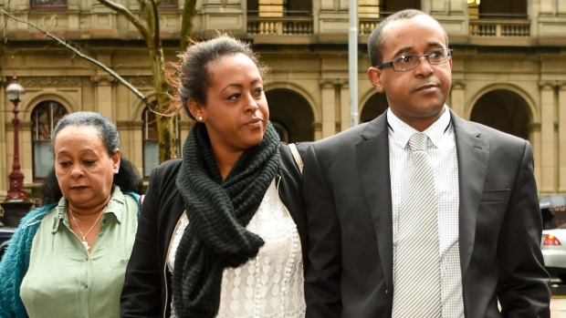 Mussie Debresay leaving court with family members after an earlier hearing.