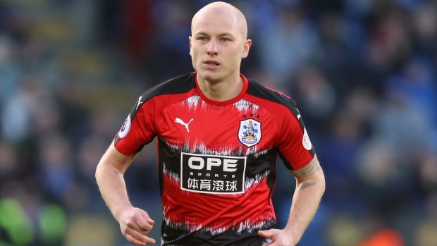Huddersfield Town's Aaron Mooy was stretchered off against Bournemouth on Sunday.