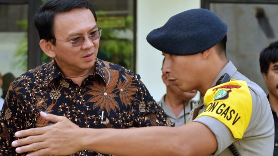 Jakarta Governor Basuki Tjahaja Purnama, popularly known as Ahok (centre), faces five years in prison if found guilty of blasphemy.