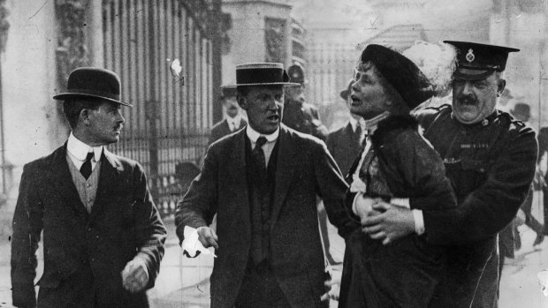 Suffragette leader Emmeline Pankhurst is arrested outside Buckingham Palace. 
