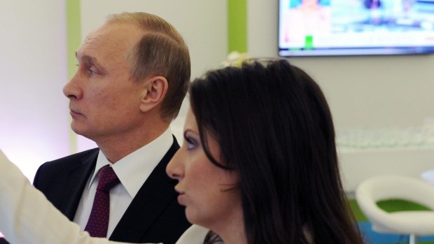 Russian President Vladimir Putin and RT's Editor-in-chief Margarita Simonyan in Moscow, Russia.