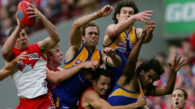 The mark: Leo Barry takes a crucial mark in the dying seconds of the 2005 grand final. 