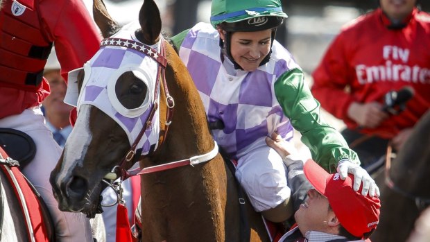 2015 Melbourne Cup winner Prince of Penzance and jockey Michelle Payne with her brother, the strapper.